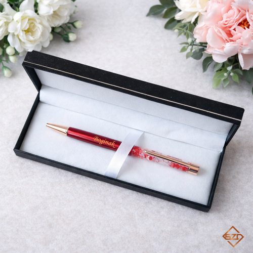 Piros virágos toll díszdobozban